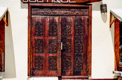 Wooden doors of a boutique african style 