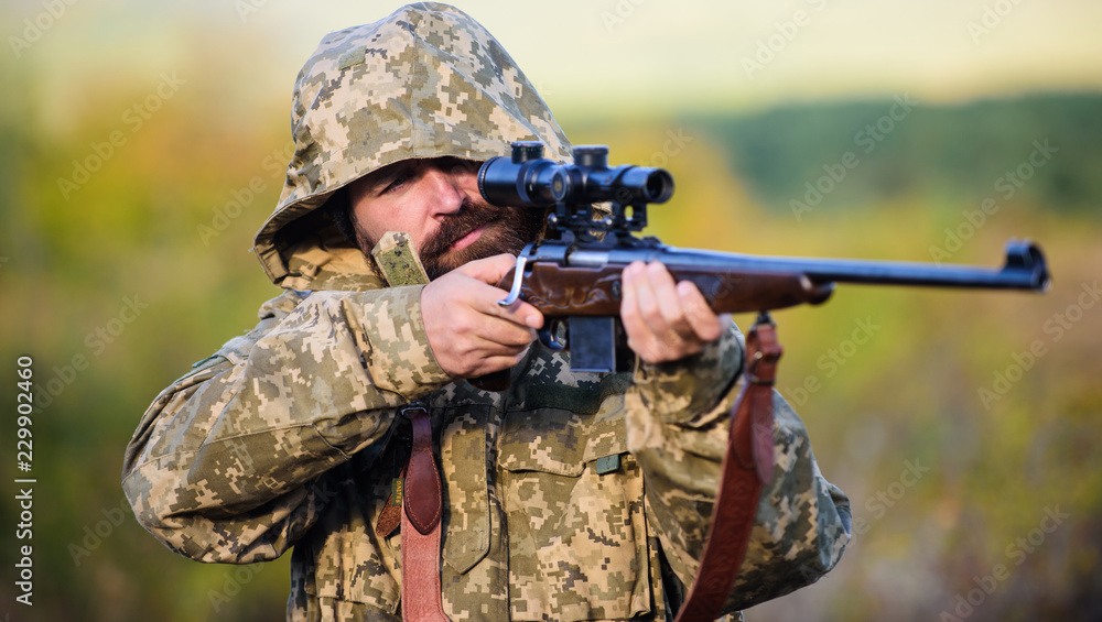 How turn hunting into hobby. Masculine hobby activity. Hunting season. Guy hunting nature environment. Man bearded hunter with rifle nature background. Experience and practice lends success hunting How turn hunting into hobby. Masculine hobby activity. Hunting season. Guy hunting nature environment. Man bearded hunter with rifle nature background. Experience and practice lends success hunting