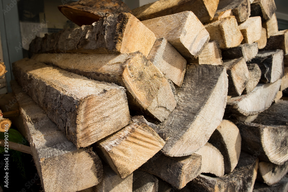 Pile of many brown timber. Stacked of timber. Pile of many brown timber. Stacked of timber.