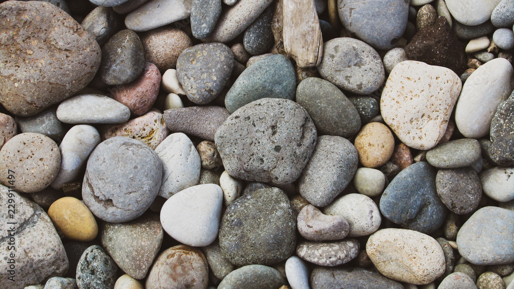 Abstract pebble nature background. Blue pebble texture. Stone background. Sea pebbles beach Abstract pebble nature background. Blue pebble texture. Stone background. Sea pebbles beach