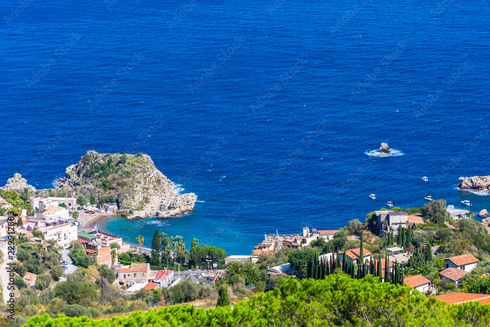 Beach view from Taormina.  Taormina has been main  tourist destination in Sicily since the 19th century. Taormina, Sicily, Italy.