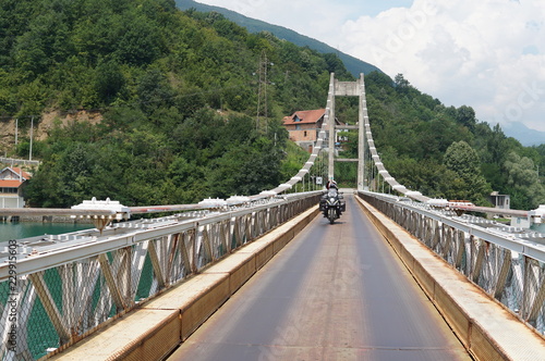 Motorcycle on bridge