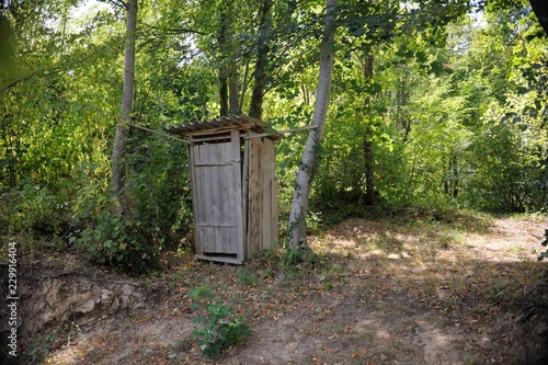 wooden retro outdoor toilet photo