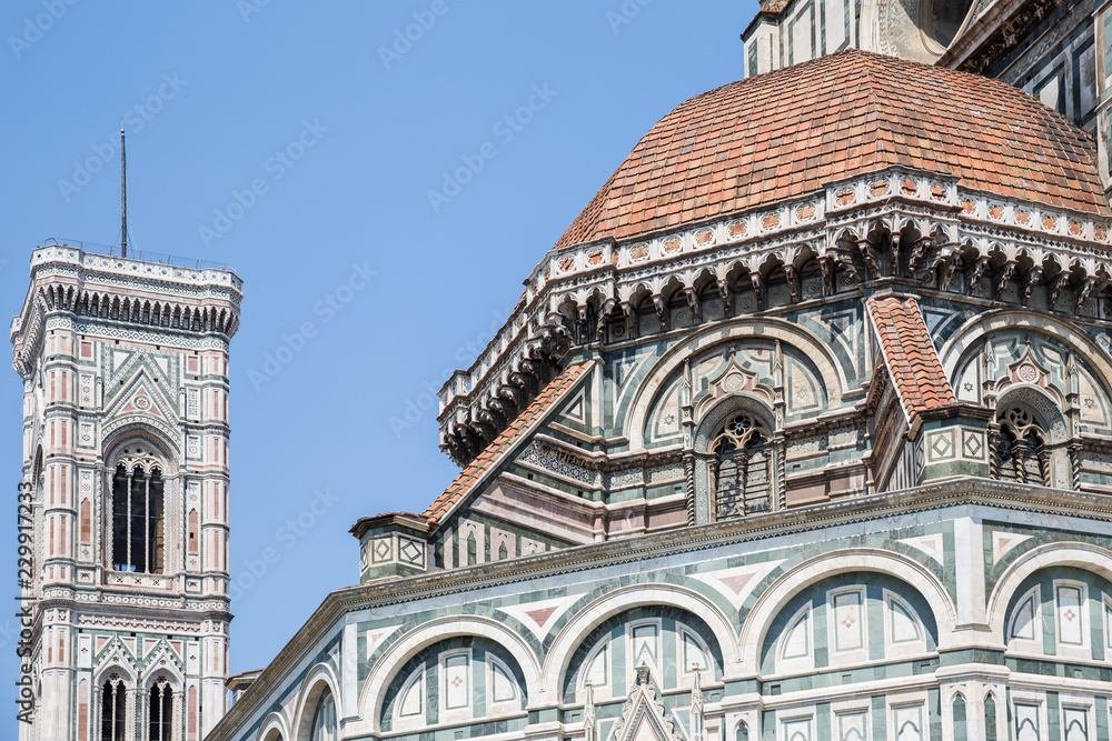 Detail from the duomo in Florence, with Giotto's bell tower in the background
