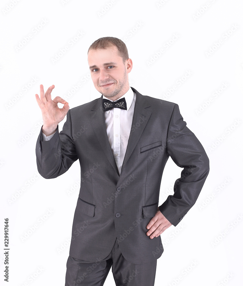 successful businessman showing sign OK.isolated on white successful businessman showing sign OK.isolated on white