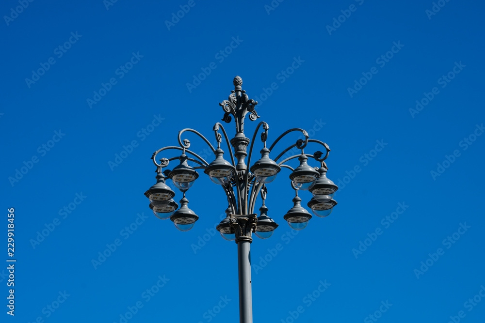 Old street lamp at Bolshoi Theater Square (Teatralnaya Ploschad). Moscow, Russia Old street lamp at Bolshoi Theater Square (Teatralnaya Ploschad). Moscow, Russia