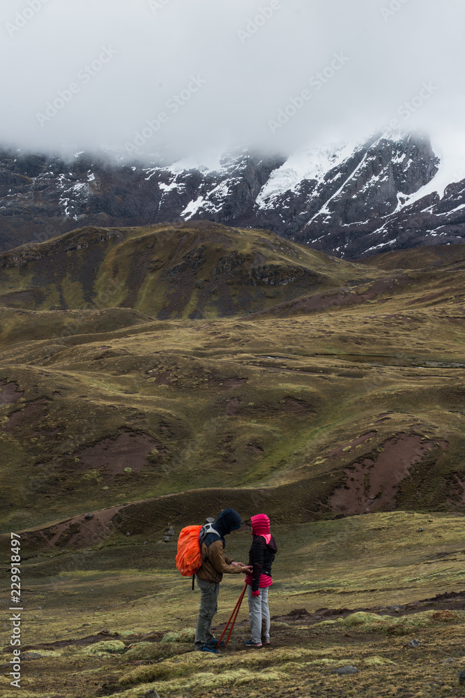 Landscape of the Vilcanota mountain chain, near by the famous rainbow mountain,  in a cloudy day of october. Perù.