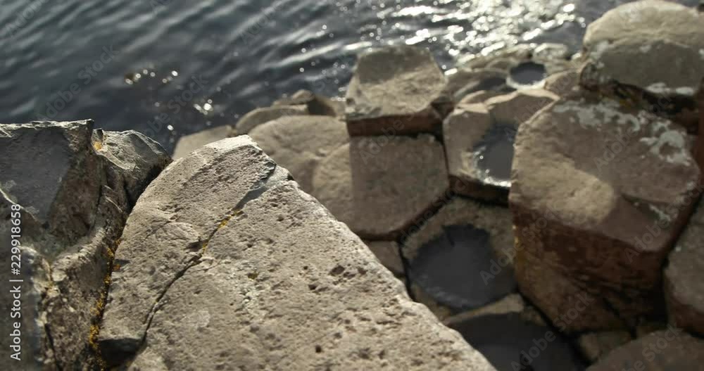 Stones in water, Giant's Causeway, Northern Ireland Stones in water, Giant's Causeway, Northern Ireland