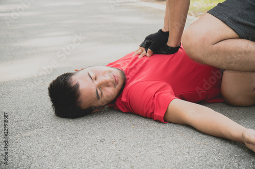 Asian man heart attack during running in park need CPR