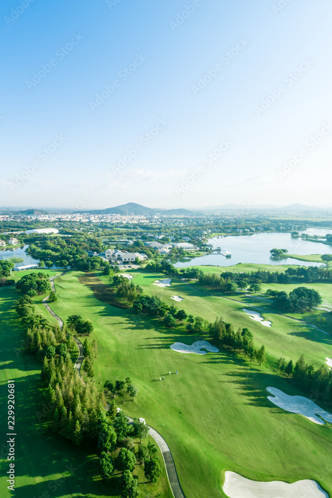 Aerial photograph of forest and golf course