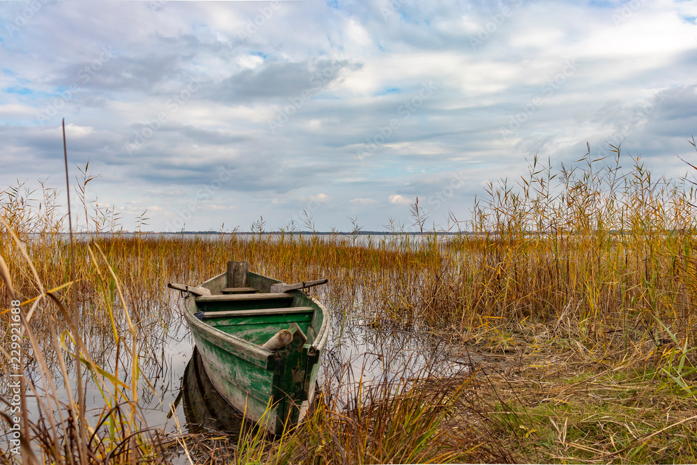 old boat on the lake