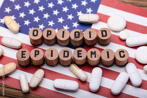 Opioid Epidemic Text With Prescription Pills Over American Flag