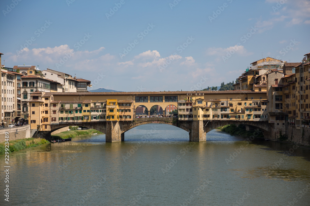 The beautiful Ponte Vecchio bridge straddling the river Arno in Florence, Italy