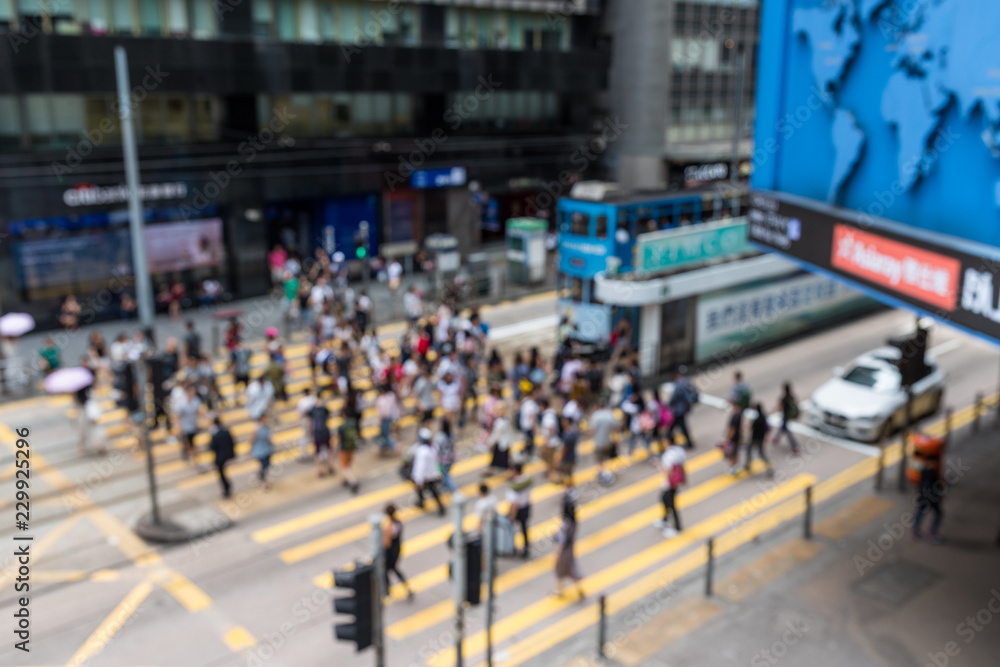 Blur of city view with people cross the road