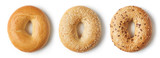 Fresh bagels on white background, from above