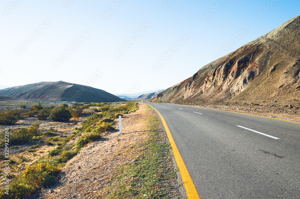 Ashplat road running through the steppe - landscape photo