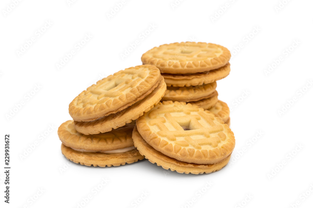 Sandwich cookies with cream on white. Sandwich cookies with cream on white.