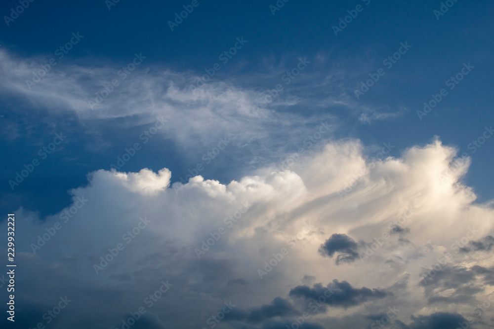 Obraz premium Beautiful blue sky with clouds background.