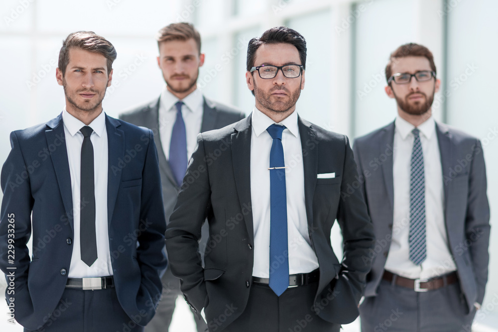 group of business people standing in the office group of business people standing in the office
