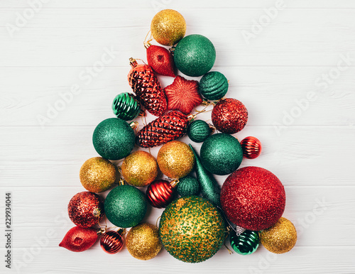 Christmas tree made of balls and toys creative composition