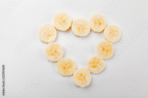 Banana heart symbol white background 