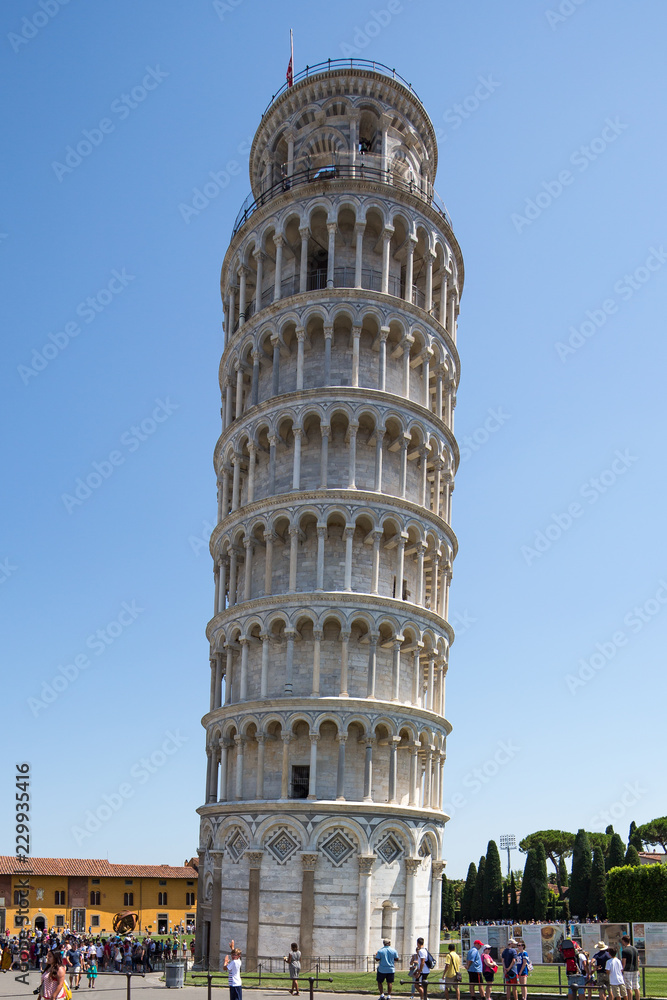 Tourists at the famous leaning tower in Pisa