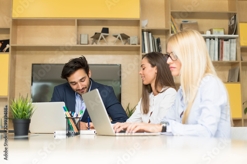 Young business team working...