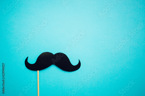 Paper Mustache on blue background, Prostate cancer awareness , Men health awareness month, cope space photo