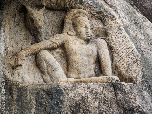 The 3rd century B. C. stone carving of man and horse at Isurumuni Rajamaha Viharaya temple in Anuradhapura, Sri Lanka