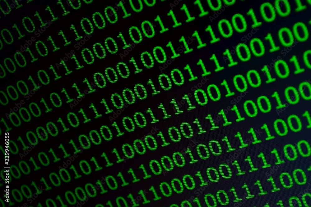 Binary code in green font on a black background, photo Binary code in green font on a black background, photo
