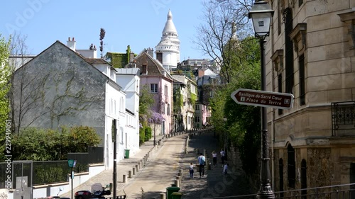Montmartre Sacre Coeur pointer from Place Dalida in Paris - most beautiful street