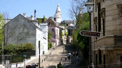 Montmartre Sacre Coeur pointer from Place Dalida in Paris - most beautiful street photo