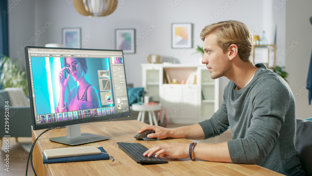 Professional Photographer Works in Photo Editing App / Software on His Personal Computer. Photo Editor Retouching Photos of Beautiful Girl. Mock-up Software Design. Professional Photographer Works in Photo Editing App / Software on His Personal Computer. Photo Editor Retouching Photos of Beautiful Girl. Mock-up Software Design.