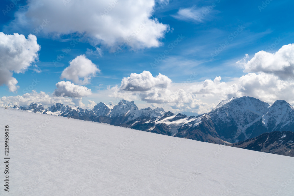 Climbers going down the snow slope