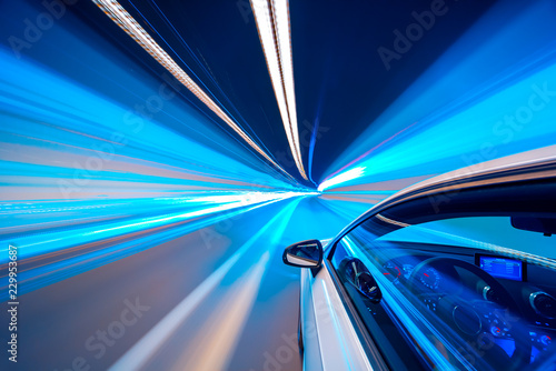 Blue color tunnel car driving motion blur