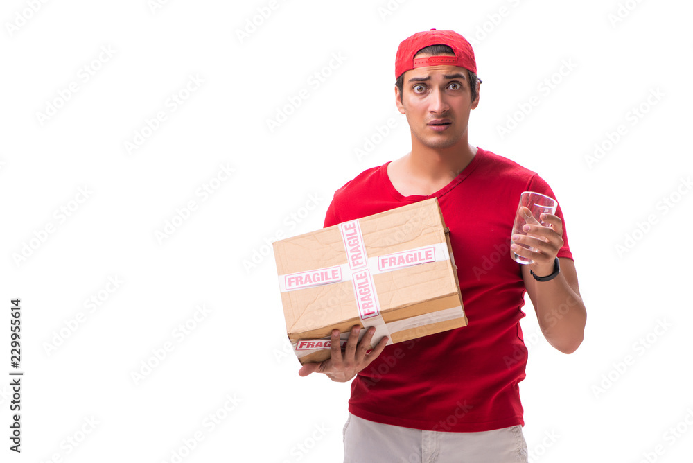 Handsome contractor holding fragile box isolated on white Handsome contractor holding fragile box isolated on white