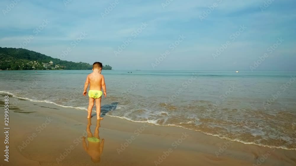Cute Baby Boy on the Beach in Thailand. Video 1080p Cute Baby Boy on the Beach in Thailand. Video 1080p