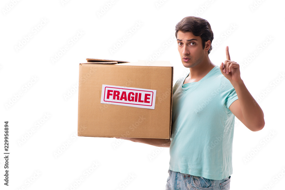 Young handsome man with fragile box ordered from Internet Young handsome man with fragile box ordered from Internet