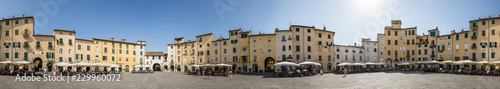 360 degree panorama of Piazza dell'Anfiteatro which is a public square in the northeast quadrant of walled center of Lucca, region of Tuscany, Italy