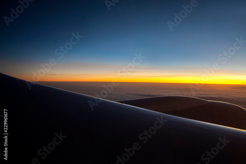 Morning sunrise with Wing of an airplane. Photo applied to tourism operators. picture for add text message or frame website. Traveling concept © Rahul