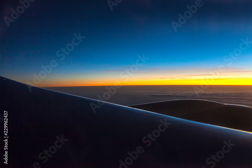 Morning sunrise with Wing of an airplane. Photo applied to tourism operators. picture for add text message or frame website. Traveling concept