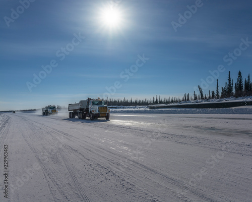 Truck Moving on the Mackenzie River Ice Road at Inuvik photo