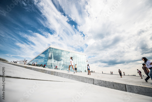 Opera House of Oslo modern architecture design walking people beautiful cloudy sky