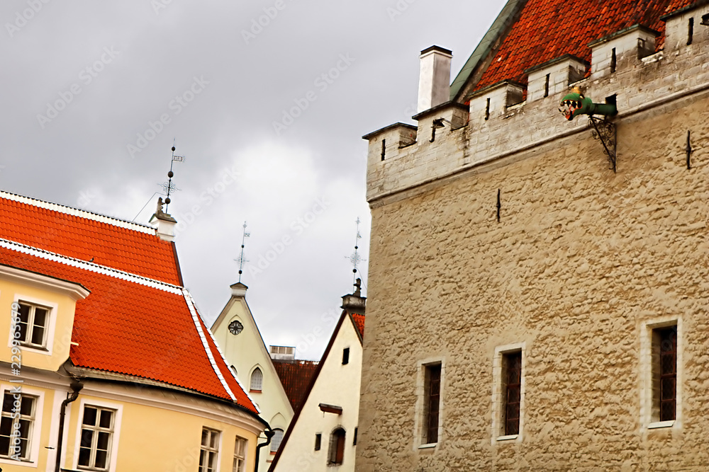 Old building and the Tallinn Town Hall in the Tallinn Old Town, Estonia, next to the Town Hall Square