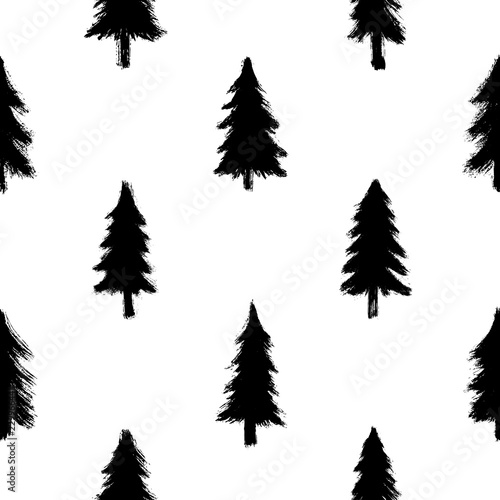 Seamless pattern with black hand-drawn in ink trees isolated on white background. Christmas wallpaper. Doodle style grunge shapes.
