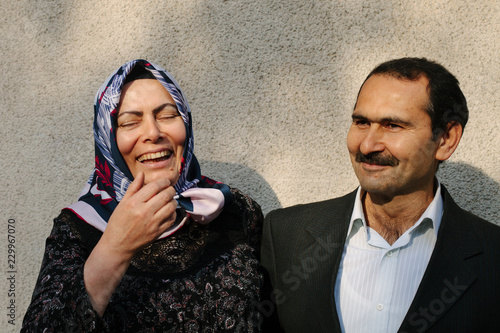 Middle aged Turkish couple show happiness and affection.