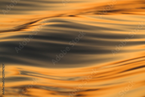 Golden sunset reflected on a river