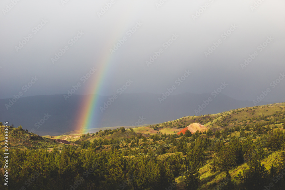 A rainbow over the Painted Hills in Oregon A rainbow over the Painted Hills in Oregon