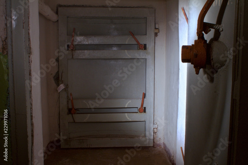 nuclear war-closed door to the bomb shelter photo