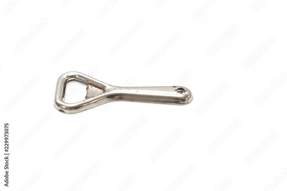 Rusty bottle opener on a white background Rusty bottle opener on a white background